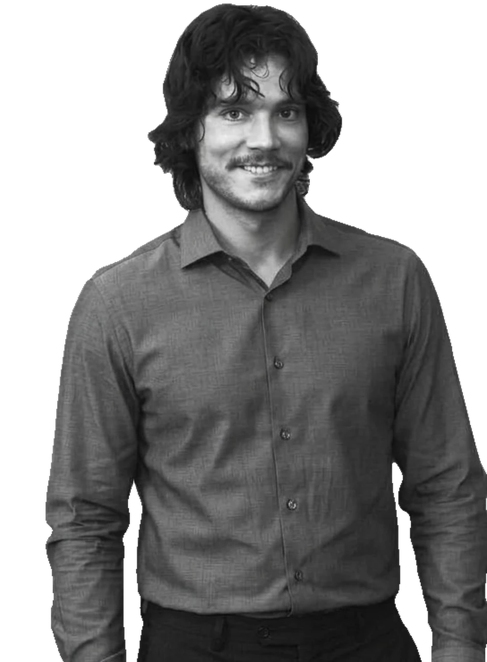 Daniel Argota, smiling, in a dark button-up shirt